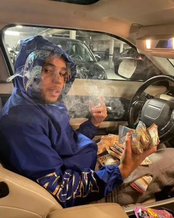 COAT BAPE is worn by Zola on the account Instagram of @binkszola