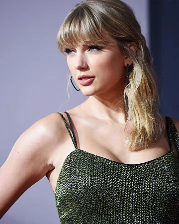 Ofira Rhombus 18 Karat Blackened White Gold Diamond Hoop Earrings of Taylor Swift on the Instagram account @taylorswift November 24, 2019