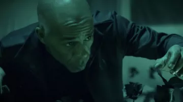 La veste zippée noire Sergio Tacchini portée par Shurik'n dans le clip Self Made Men de IAM feat. Psy 4 De La Rime