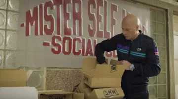 Le survêtement noir Sergio Tacchini porté par Akhenaton dans le clip Self Made Men de IAM feat. Psy 4 De La Rime