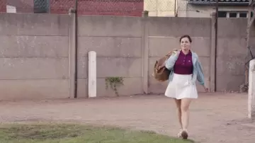 Lacoste polo eggplant worn by Catherine Guerin (Laure Calamy) in A Beautiful team