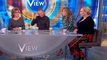 Reformation Creed print­ed crepe mi­di dress worn by Sunny Hostin on The View November 25, 2019