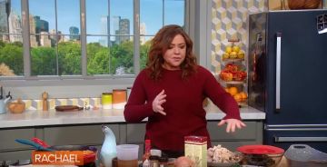 Theory Dark Cherry Karenia Cashmere Knit Top usado por Rachael Ray en The Rachael Ray Show noviembre 25, 2019