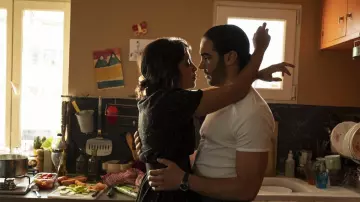 Print black dress worn by Amira (Leïla Bekhti) in The Eddy Season 1