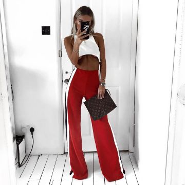 Pretty Little Thing Red Flared Trousers of Emily Cocklin on the Instagram account @emilycocklin
