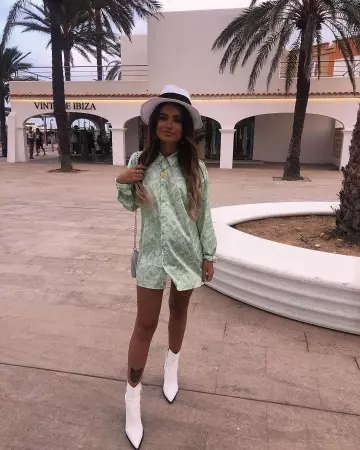 White West­ern Boots of Leigh Woodz on the Instagram account @leighwoodz1