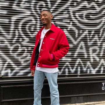 The red jacket Noon Goons carried by Asean on his account Instagram @takeamicofficiel 