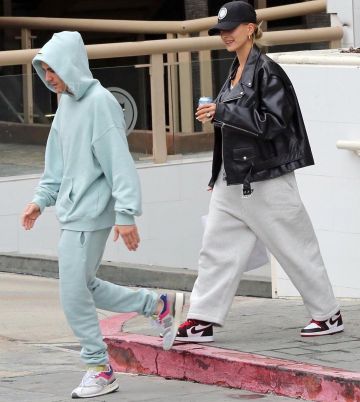 T By Alexander Wang Wide Leg Track Trousers worn by Hailey Baldwin Out in Los Angeles November 30, 2019