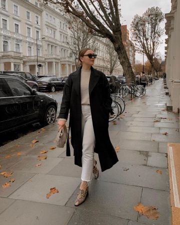 Black Belted Coat of Alix on the Instagram account @icovetthee