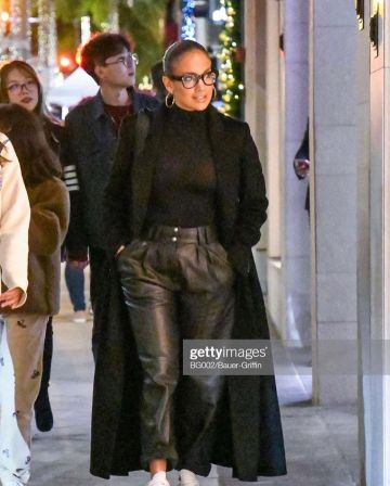 Balmain Pleat­ed Leather Ta­pered Pants worn by Jennifer Lopez Beverly Hills November 29, 2019