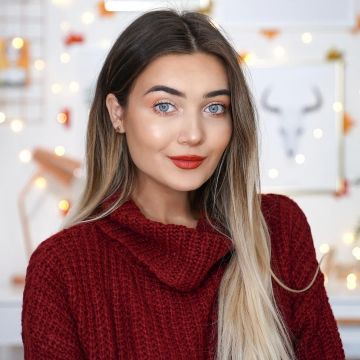 Jersey de punto de cuello alto de Roxi en la cuenta de Instagram @roxxsaurus