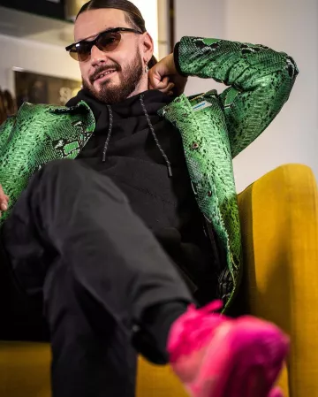 The jacket green snake skin worn by SCH on his account Instagram @sch