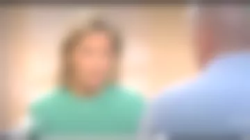 The cashmere sweater light green by Claire Chazal in the Passage of the Arts