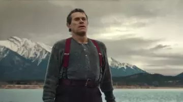 Knit Quar­ter But­ton Down Sweater worn by Leonhard Seppala (Willem Dafoe) in Togo