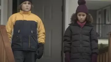 Windproof black-and-yellow Child #2 (Casey Dubois) in the continuation of Christmas