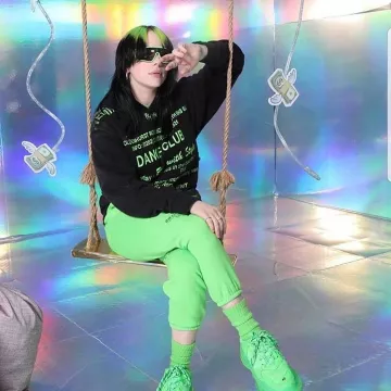 Balenciaga Green Triple S Sneak­ers of Billie Eilish on the Instagram account @billieeilish December 8, 2019