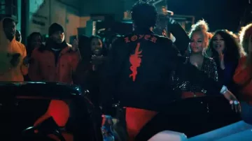 Amiri Dag­ger Heart Patch Black Jack­et of Lil Baby in the music video Lil Baby - Woah (Official Music Video)