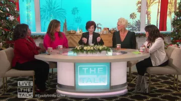 Badgley mischka V-Neck Bal­loon Sleeve Cock­tail Dress worn by Brigitte Nielsen on The Talk December 3, 2019