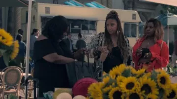 Celine Black Leather Handbag worn by Poppy Parnell (Octavia Spencer) in Truth Be Told Season 1 Episode 2