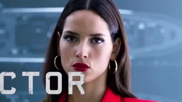 Gold hoop earrings (Adria Arjona) in 6 Underground