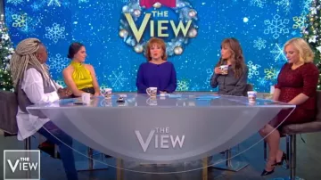 La ligne Di­rec­tion­al Stripe Belt­ed Long Sleeve Silk Shirt­dress worn by Sunny Hostin on The View December 9, 2019