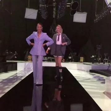 Thom Browne Bar Pleat­ed Mi­ni Skirt worn by Karlie Kloss Instagram December 10, 2019