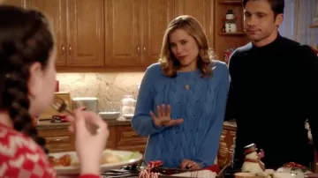 Blue sweater knit twisted Cynthia Faber (Susie Abromeit) in A Christmas (almost) perfect