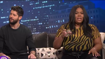 Pretty little thing Ze­bra Print High Neck Body­suit worn by Nina Grace Parker Ecklund on E! News December 10, 2019