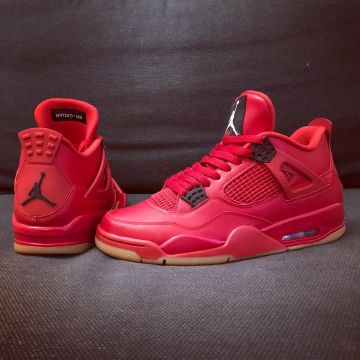 The pair of sneakers Nike Jordan 4 Retro Fire Red Singles Day 2018 on the account Instagram of @yanncj23