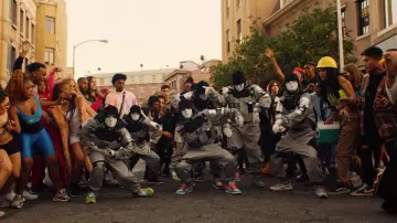 Sneakers Nike Jordan 1 Retro High Off-White University Blue worn by an extra in the clip BOP on Broadway (Hip Hop Music) of DaBaby