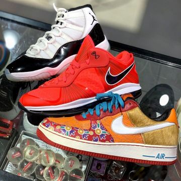 The pair of Nike Air Force 1 Low Year Of The Dog account on the Instagram of @larrydeadstock