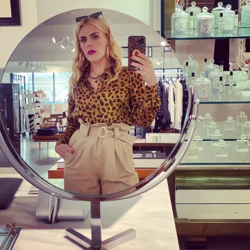GANNI High-rise cotton-blend chino trousers worn by Busy Philipps on the Instagram account @busyphilipps