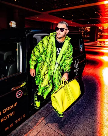 Louis Vuitton Keepall Bandouliere Monogram usado por Dj Snake en su publicación de Instagram @djsnake
