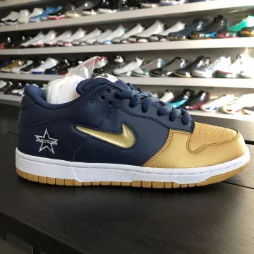 Nike SB Dunk Low Supreme Jewel Swoosh Gold on the account Instagram of @rif.sf