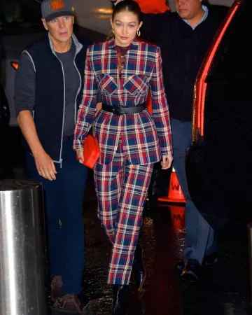 Louis Vuitton Pochette Volga Monogram Rouge worn by Jelena Noura "Gigi" Hadid iHeartRadio Jingle Ball December 13, 2019