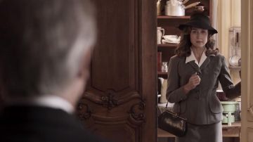 The hand bag baguette black crocodile leather vintage Janot Reichenbach (Elsa Zylberstein) in I dream only of you