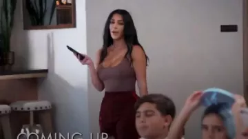 Adidas Red Yeezy Calabasas Track Pants worn by Kim Kardashian in L'incroyable Famille Kardashian Season 17 Episode 12