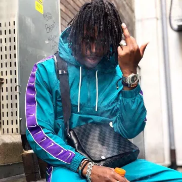 Jogging nike turquoise and purple worn by Koba The D on the account Instagram of @koba_lad