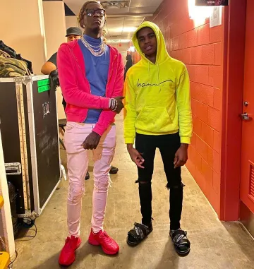 Tap Louis Vuitton (black) YBN Almighty Jay on the account Instagram of @ybnalmightyjay