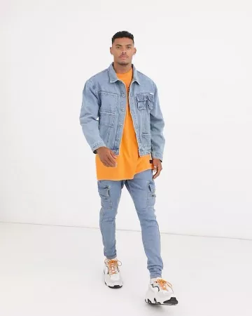 Tshirt organe tmmy hilfiger porté par tyrone clarke sur le compte Instagram de @asos_ty