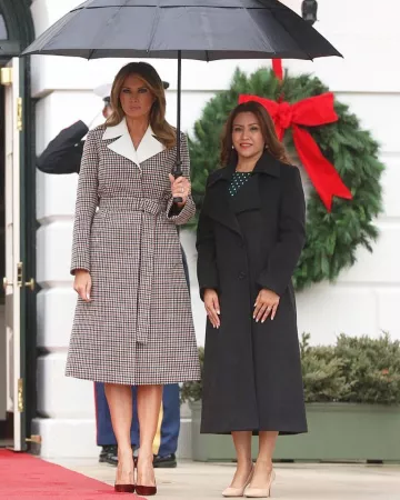 Chloé Check Belt­ed But­toned Coat worn by Melania Trump With the Guatemalan President December 17, 2019