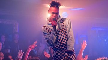 Black and white checkerboard overalls in Rhythm + Flow (S01E03)