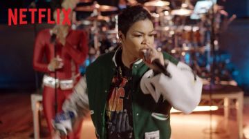 Green and white varsity jacket of Teyana Taylor in Rhythm + Flow (S01E09)