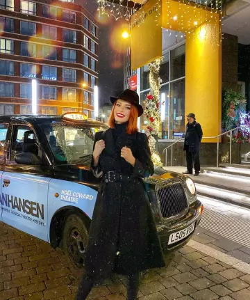 Black coat long Maëva Coucke account on the Instagram of @maevacouckeoff