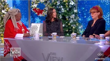 Whoopi Red Christ­mas Cape Sweater worn by Whoopi Goldberg on The View December 17, 2019