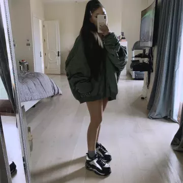 Vetements Al­pha In­dus­tries Over­sized Hood­ed Bomber Jack­et of Ariana Grande on the Instagram account @arianagrande December 18, 2019