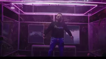 La sweatshirt noir Maison Kitsuné porté par D.T.F dans son clip Dans la ville feat. N.O.S