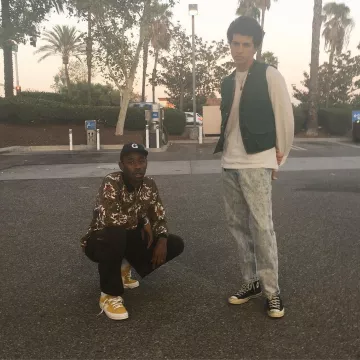 Sneakers low white and yellow worn by Tyler, The Creator on the account Instagram of @feliciathegoat