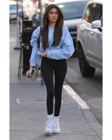 Fendi Mono­gram Baguette Bag worn by Madison Beer West Hollywood December 18, 2019