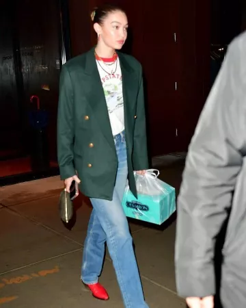 Re/Done Sol­id & Striped Tee worn by Gigi Hadid New York City December 17, 2019